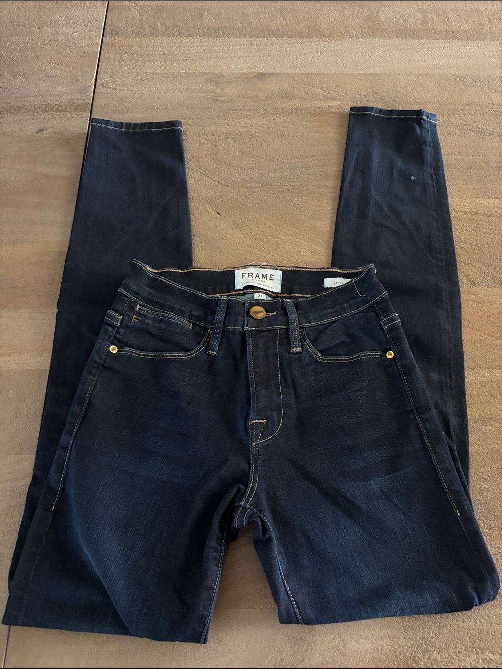 Frame Denim Skinny Jeans in Deep Indigo with Gold Hardware